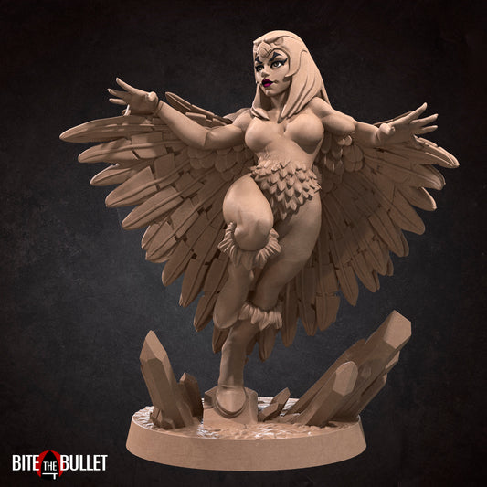 Marina the sorceress wearing a feathered cloak and owl headdress; resin miniature by Bite the Bullet.