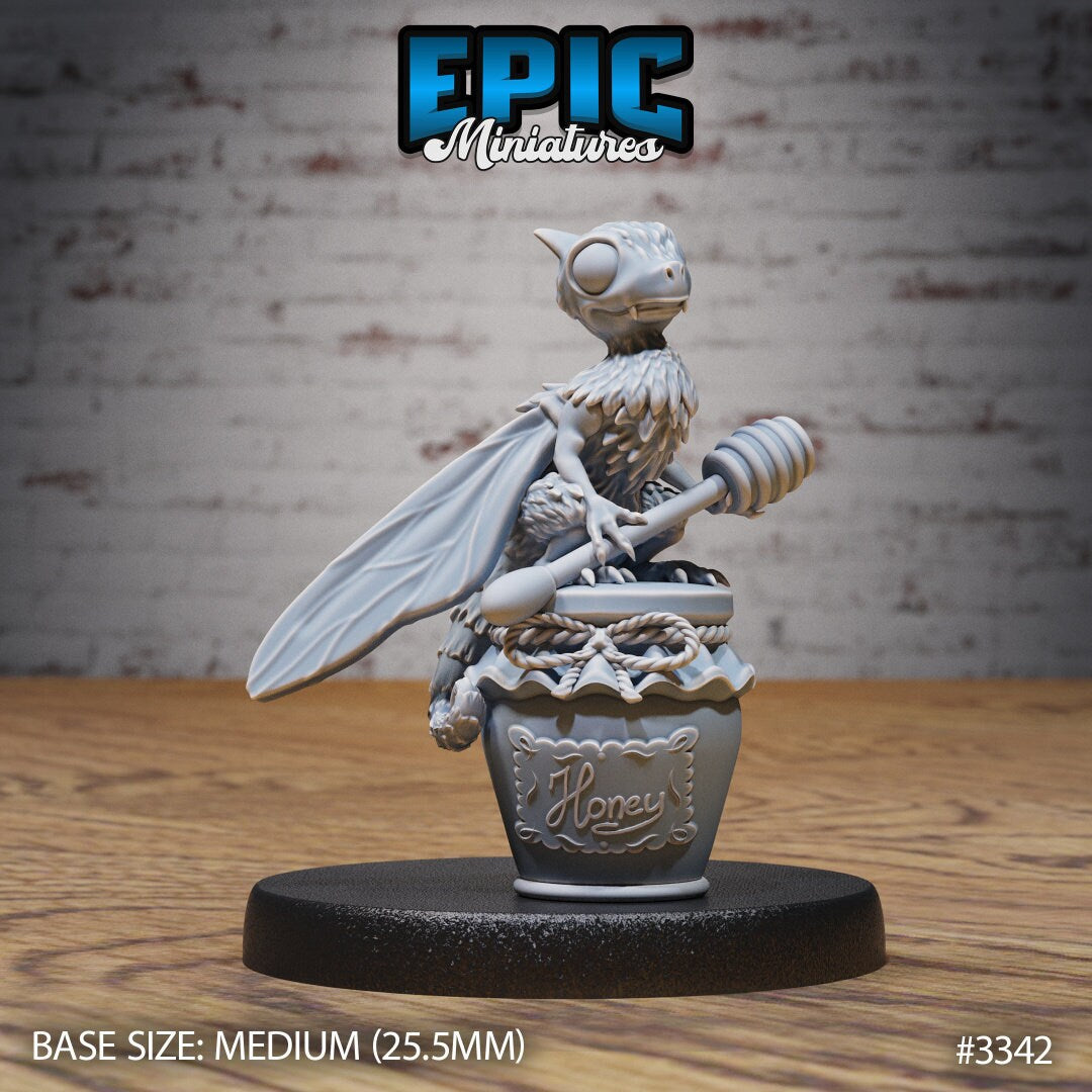 Resin Bee-Dragon Wyrmling miniature by Epic Miniatures. Version #1: perched on a jar of honey, clutching a honey dipper.
