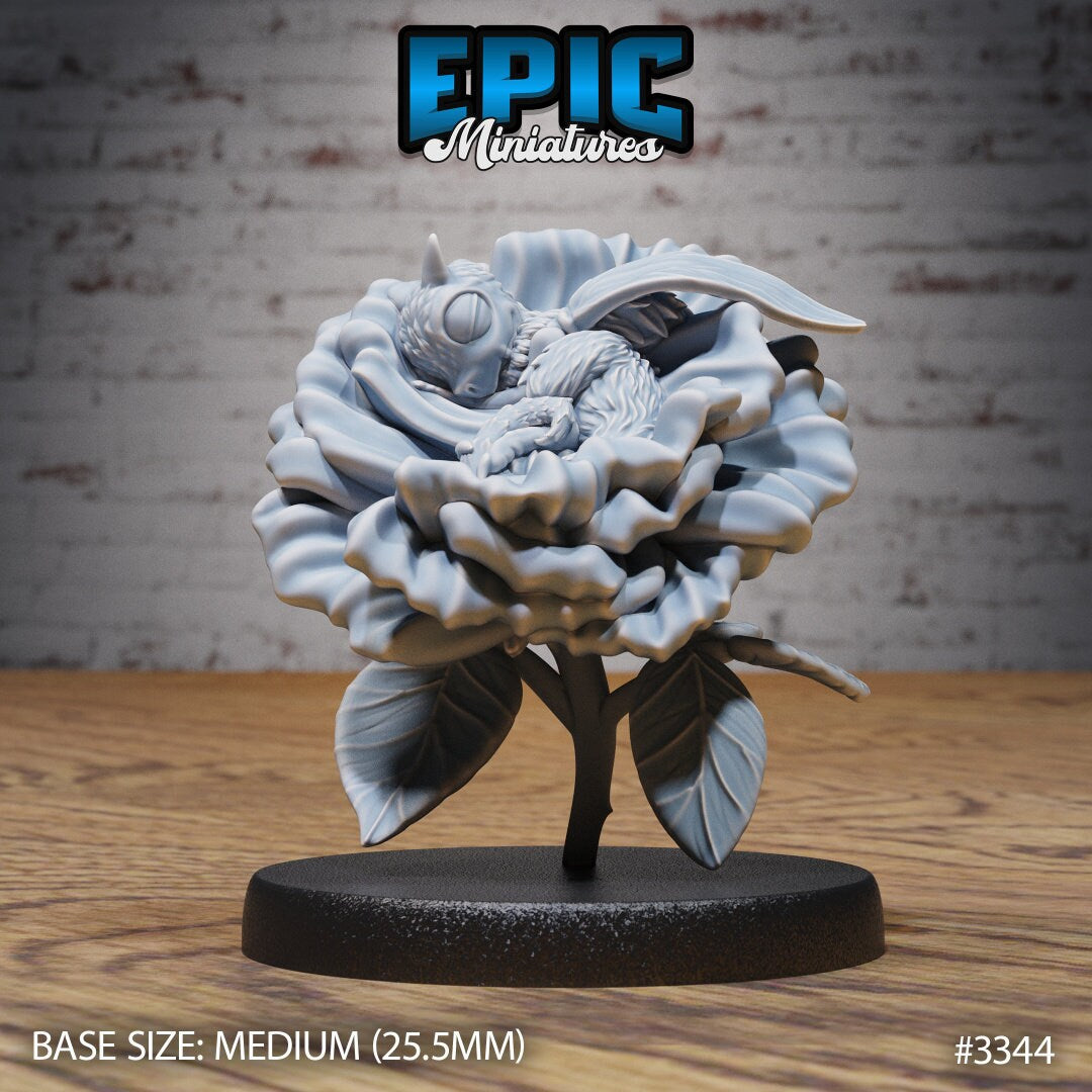 Resin Bee-Dragon Wyrmling miniature by Epic Miniatures. Version #3: wyrmling sleeping in flower.