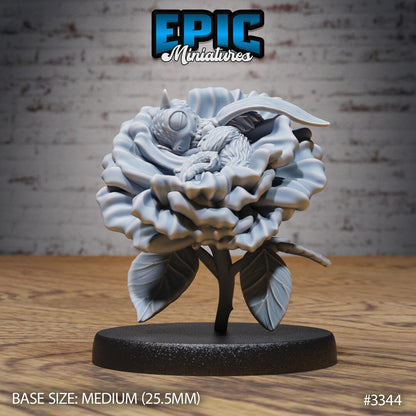 Resin Bee-Dragon Wyrmling miniature by Epic Miniatures. Version #3: wyrmling sleeping in flower.