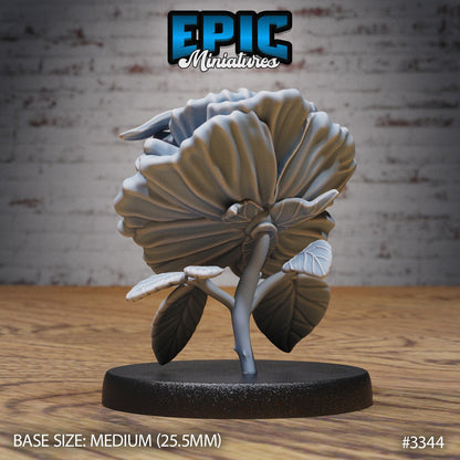 Resin Bee-Dragon Wyrmling miniature by Epic Miniatures. Version #3: wyrmling sleeping in flower, rear view.