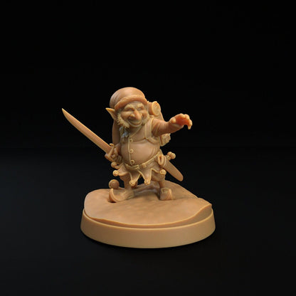 Christmas elf resin miniature by The Dragon Trapper's Lodge. Version #3: wielding a sword and pointing.