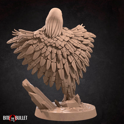 Marina the sorceress wearing a feathered cloak and owl headdress; resin miniature by Bite the Bullet.