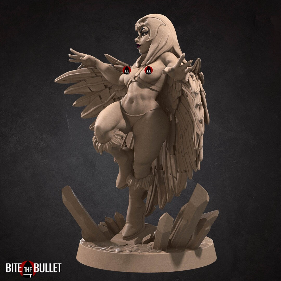 Marina the sorceress wearing a feathered cloak and owl headdress; resin miniature by Bite the Bullet. Censored topless image.