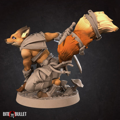 Anthropomorphic red fox rogue holding a curved dagger; resin miniature by Bite the Bullet.