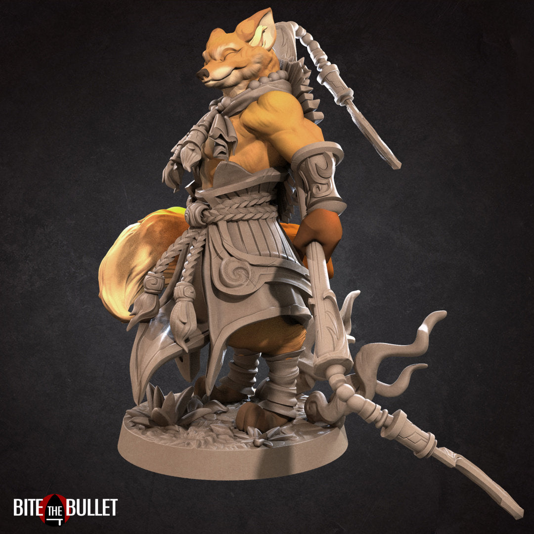 Anthropomorphic red fox monk holding a staff; resin miniature by Bite the Bullet.