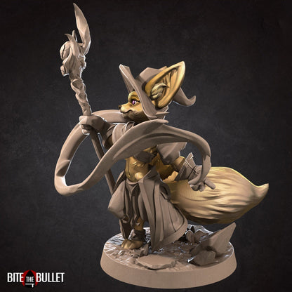 Anthropomorphic fennec fox wizard holding a staff; resin miniature by Bite the Bullet.