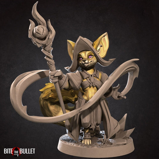 Anthropomorphic fennec fox wizard holding a staff; resin miniature by Bite the Bullet.