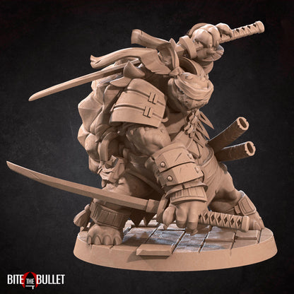 Anthropomorphic turtle ninja with a headband, wielding dual katanas. Resin miniature by Bite the Bullet.
