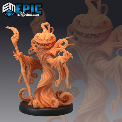 Resin miniature by Epic Miniatures. Pumpkin reaper option #1: pumpkin-headed, robed figure holding a staff and stretching out an empty hand.