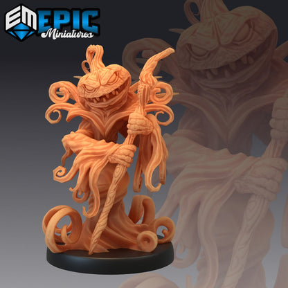 Resin miniature by Epic Miniatures. Pumpkin reaper option #3: pumpkin-headed, robed figure holding a staff in both hands.