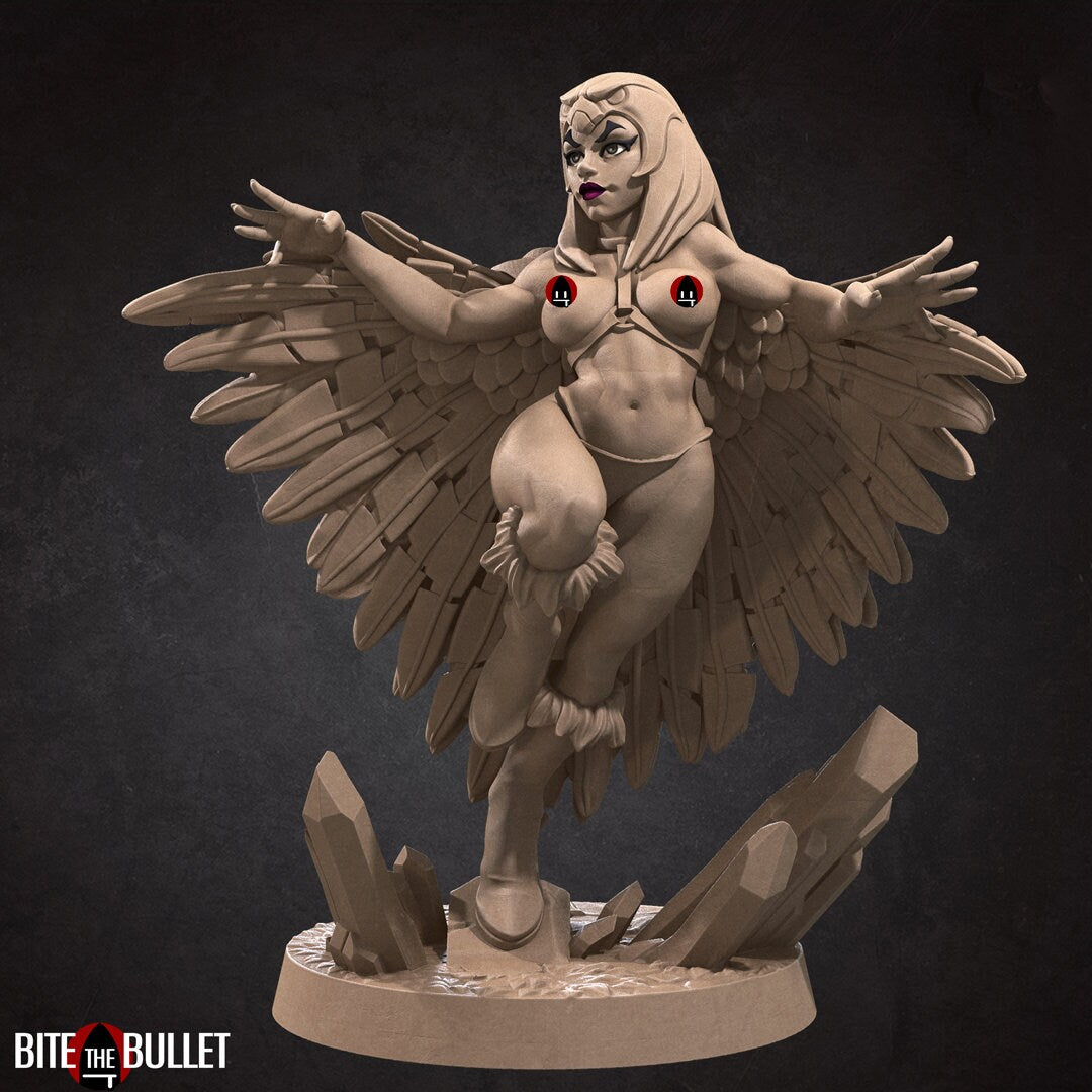 Marina the sorceress wearing a feathered cloak and owl headdress; resin miniature by Bite the Bullet. Censored topless image.