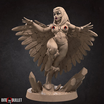 Marina the sorceress wearing a feathered cloak and owl headdress; resin miniature by Bite the Bullet. Censored topless image.