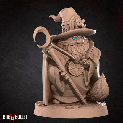 Anthropomorphic cat wizard wearing a pointed hat and carrying a staff with a crescent moon at the top; resin miniature by Bite the Bullet.