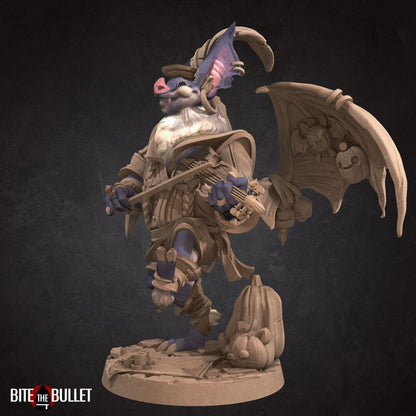 Anthropomorphic bat playing a fiddle, wings spread to display puppets hanging from them. Resin miniature by Bite the Bullet.
