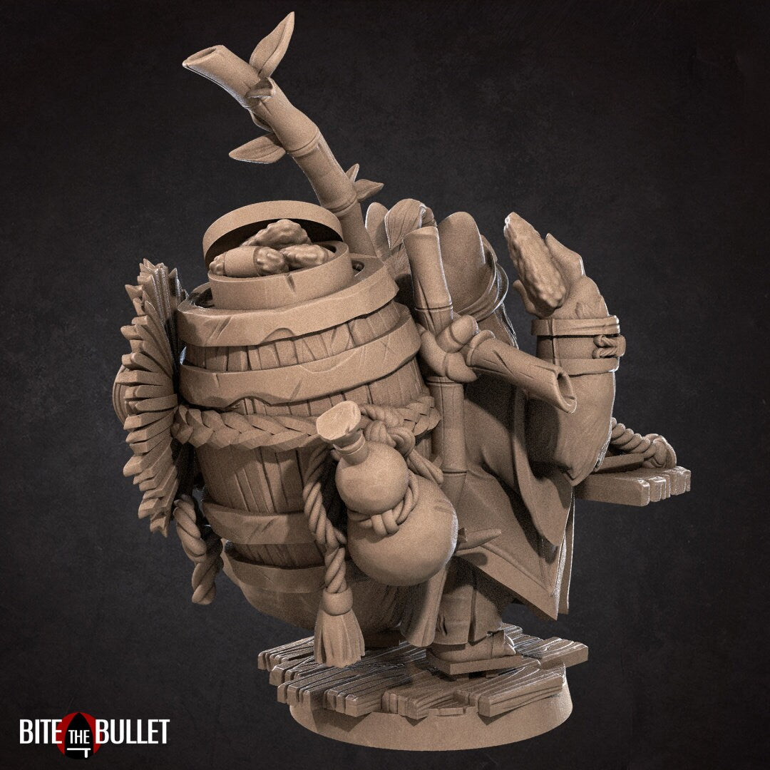 Tanuki (anthropomorphic racoon) ramen vendor with a tray strapped to his chest and additional supplies on his back. Resin miniature by Bite the Bullet.