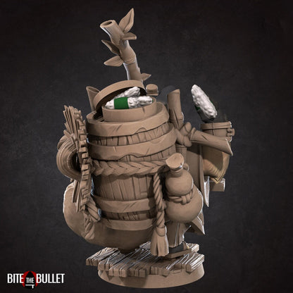 Tanuki (anthropomorphic racoon) ramen vendor with a tray strapped to his chest and additional supplies on his back. Resin miniature by Bite the Bullet.