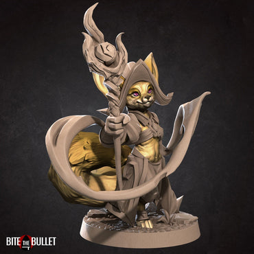 Anthropomorphic fennec fox wizard holding a staff; resin miniature by Bite the Bullet.