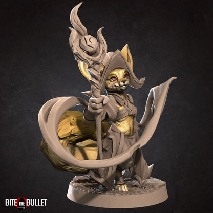 Anthropomorphic fennec fox wizard holding a staff; resin miniature by Bite the Bullet.