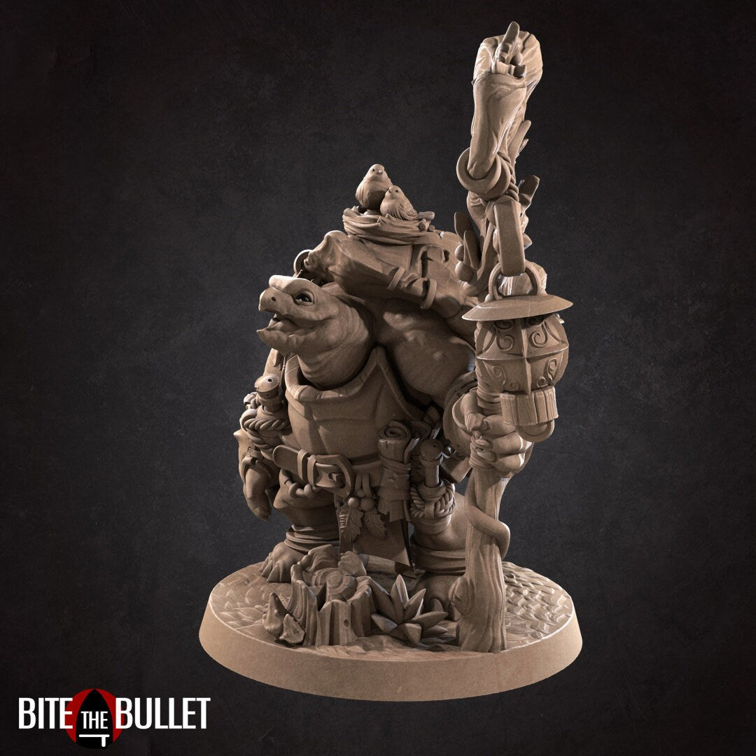 Anthropomorphic tortoise holding a staff, a squirrel perched on his arm. Resin miniature by Bite the Bullet.