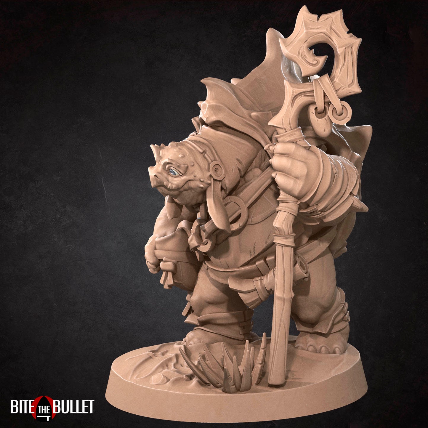 Anthropomorphic turtle with a kindly expression, holding a staff. Resin miniature by Bite the Bullet.