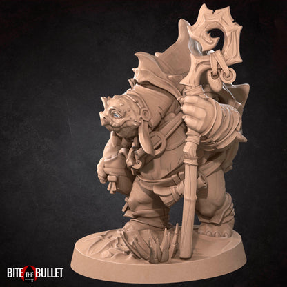 Anthropomorphic turtle with a kindly expression, holding a staff. Resin miniature by Bite the Bullet.